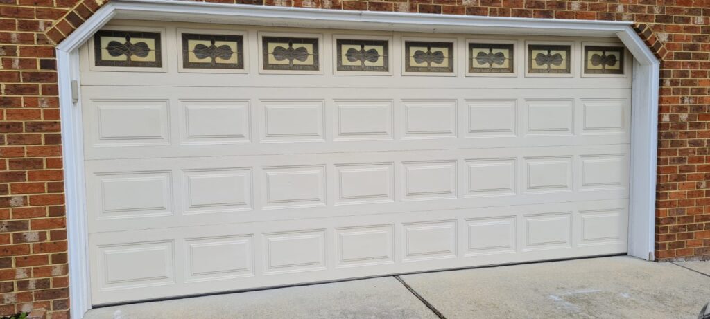 KSGold technician repairing garage door springs Virginia